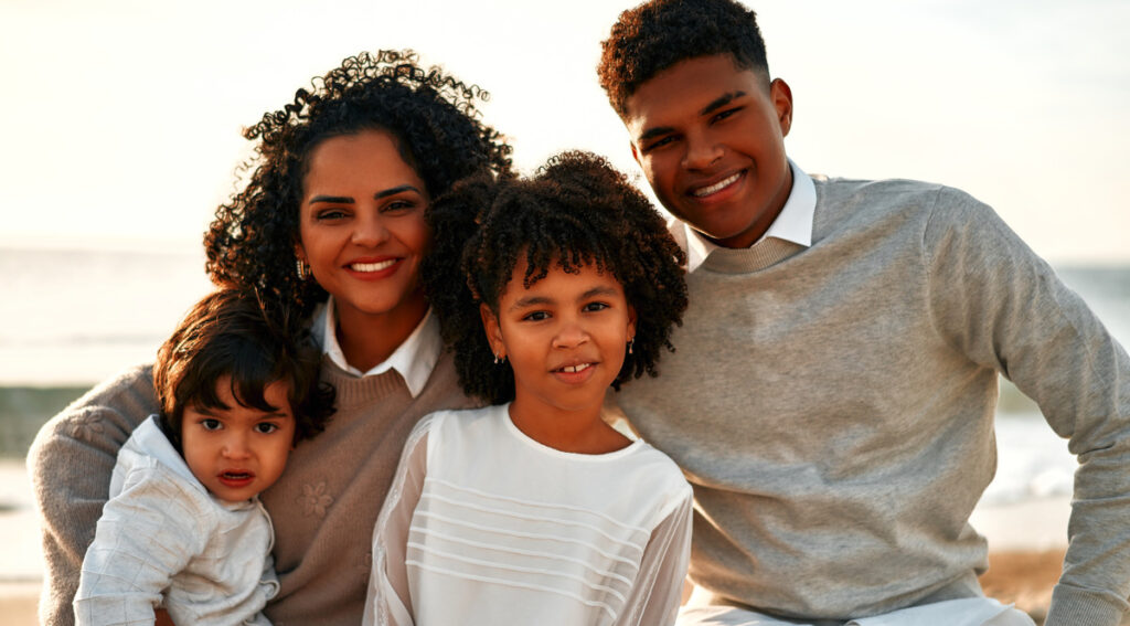 Family Portrait at the beach on a weekend that has been set on agreement with child custody