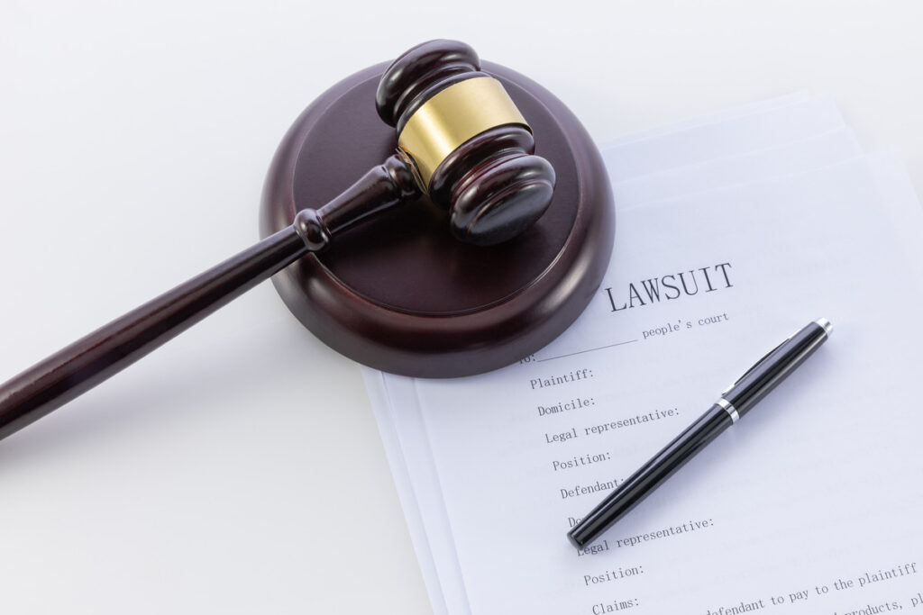A lawyer discussing medical malpractice claims to a client
